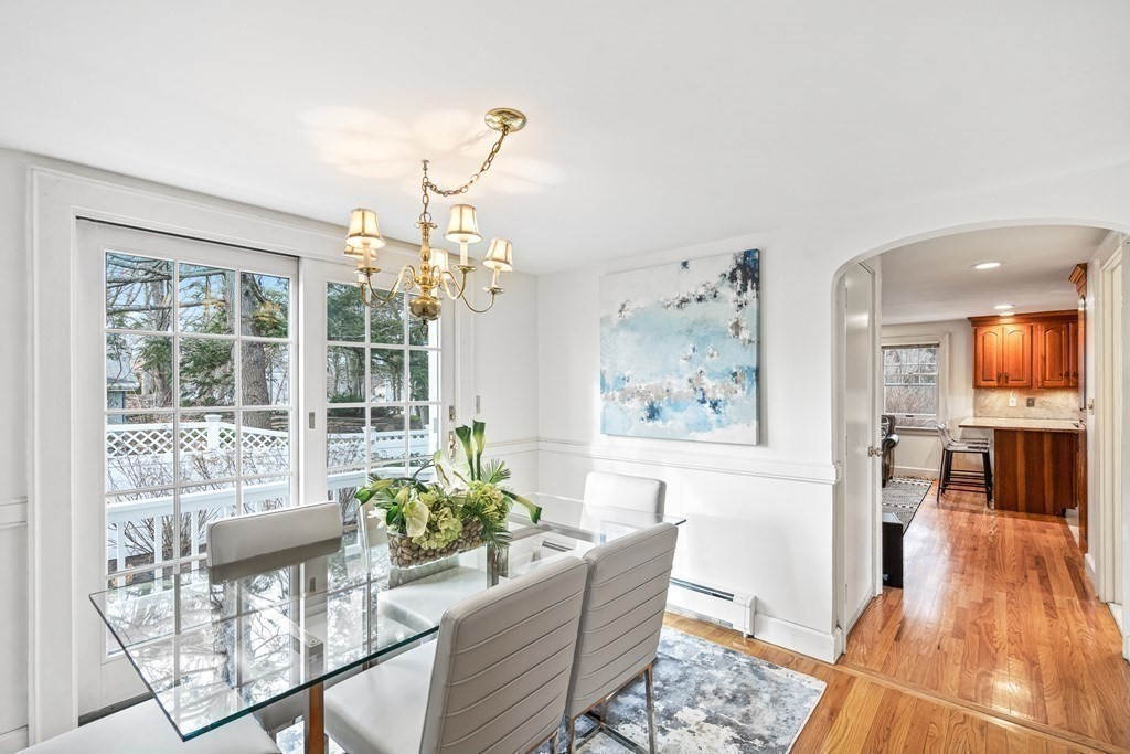 14 Fife Road Wellesley, MA 02481 - Photo 10 of 36 a living room with furniture and a chandelier