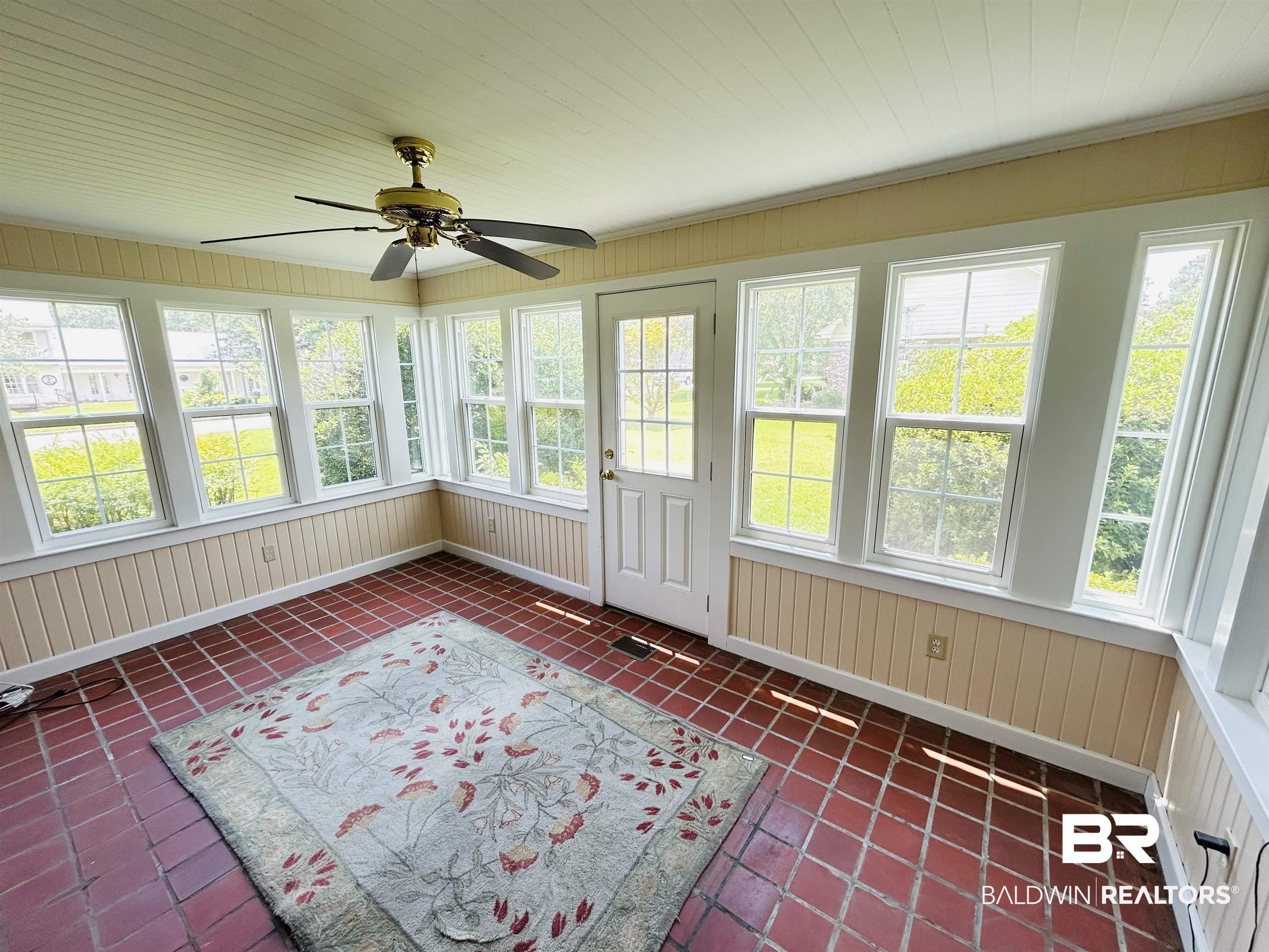 1405 Escambia Avenue Brewton, AL 36426 - Photo 8 of 16 Unfurnished sunroom with a ceiling fan and plenty of natural light