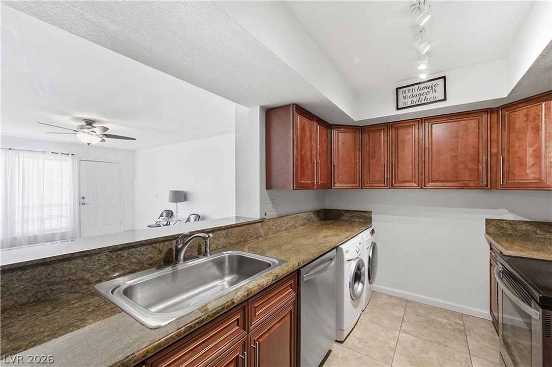 2838 Geary Place, Unit 4017 Las Vegas, NV 89109 - Photo 10 of 31 This thoughtfully designed kitchen offers granite countertops, stainless steel refrigerator + all appliances and washer and dryer!