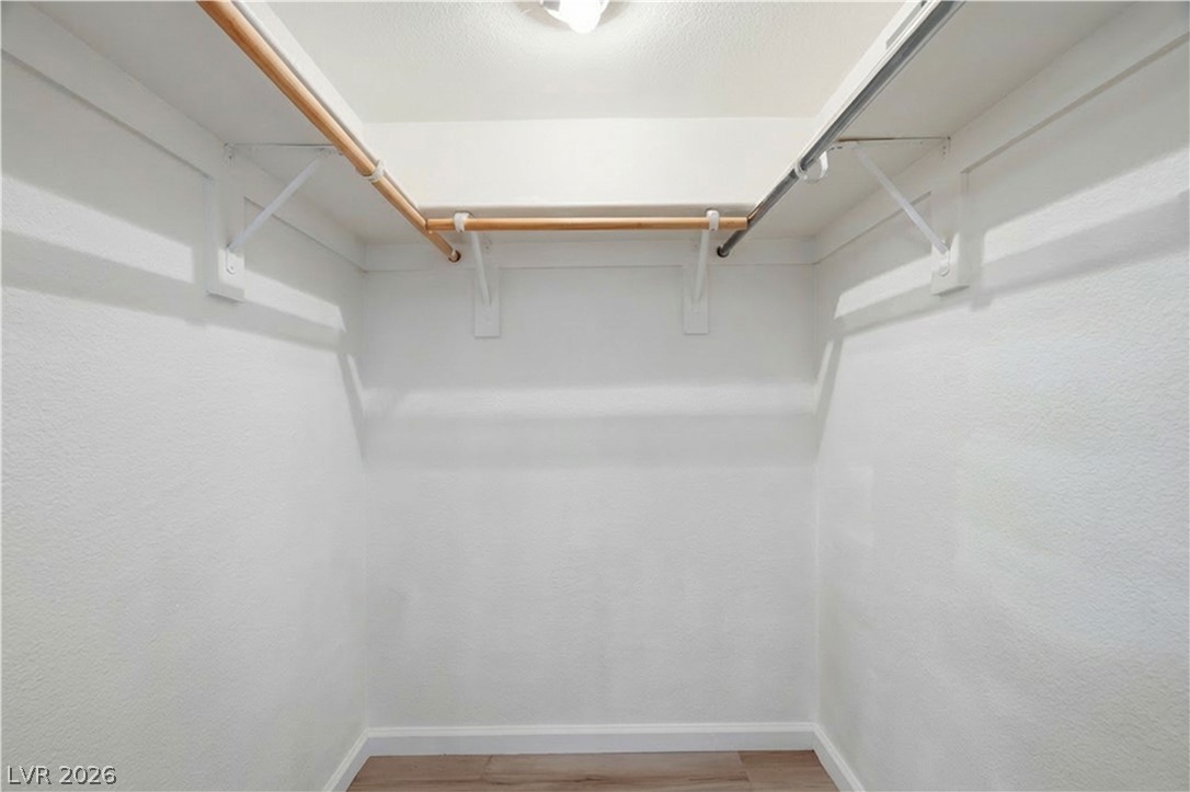 2838 Geary Place, Unit 4017 Las Vegas, NV 89109 - Photo 18 of 31 The second walk-in closet provides bonus storage in the primary suite, ideal for organizing belongings or creating a his-and-hers setup.