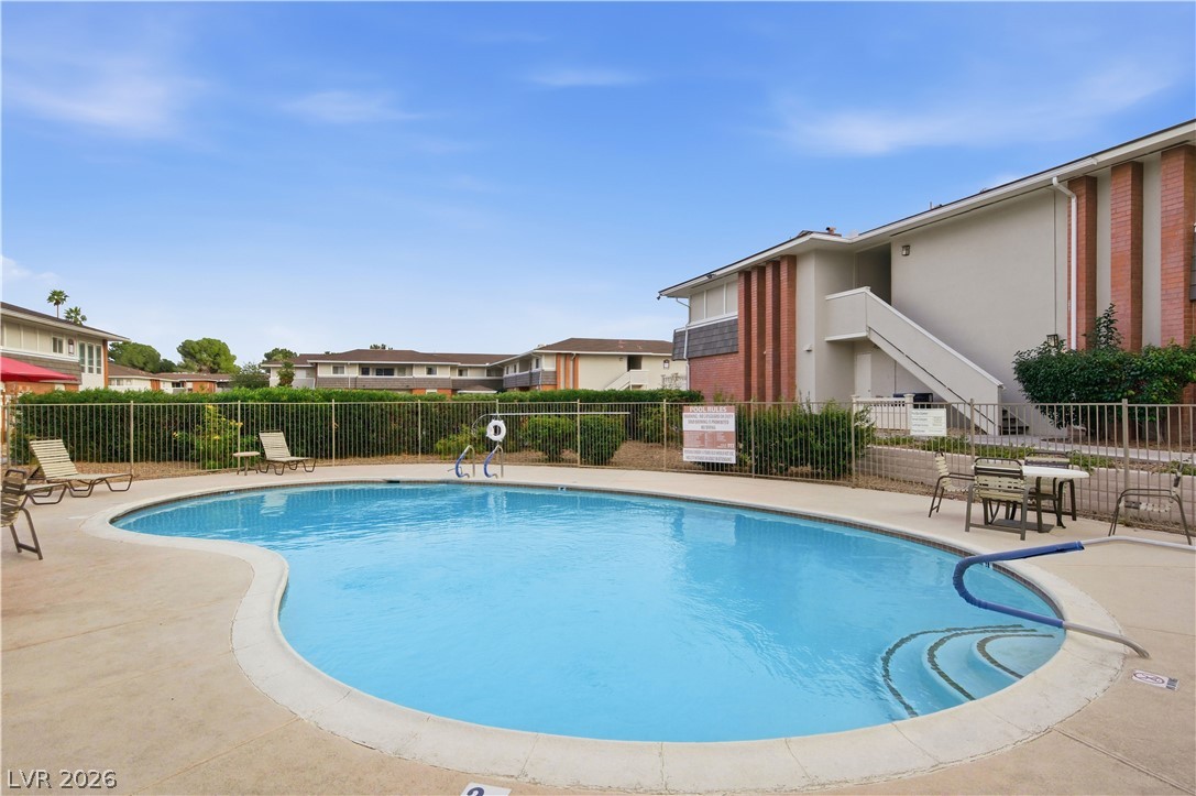 2838 Geary Place, Unit 4017 Las Vegas, NV 89109 - Photo 26 of 31 Residents enjoy access to multiple community pools, offering convenient options for relaxation and recreation throughout the neighborhood.
