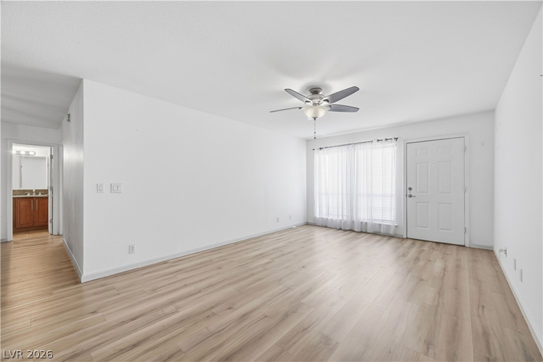 2838 Geary Place, Unit 4017 Las Vegas, NV 89109 - Photo 30 of 31 Enjoy an open floorplan from the living area, to the kitchen and dining room!