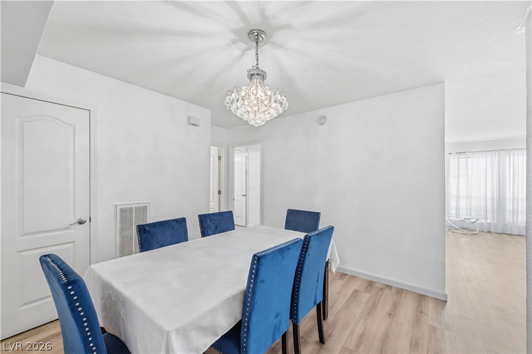 2838 Geary Place, Unit 4017 Las Vegas, NV 89109 - Photo 9 of 31 With the kitchen steps away from this dining area, hosting becomes simple and comfortable.