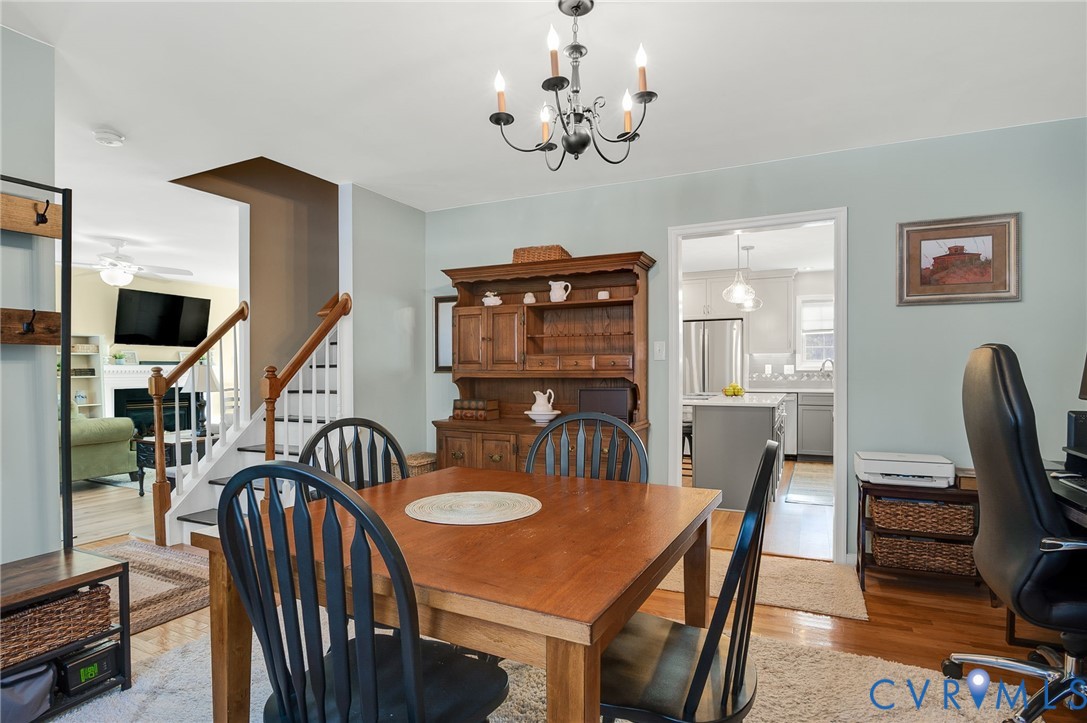 13366 Depot Road Hanover, VA 23069 - Photo 13 of 27 a view of a a dining room with furniture window and wooden floor