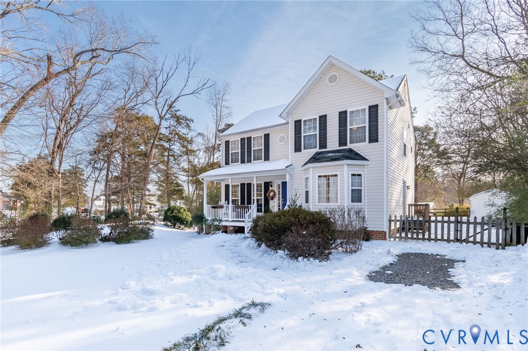13366 Depot Road Hanover, VA 23069 - Photo 2 of 27 a front view of a house with a yard and a large tree
