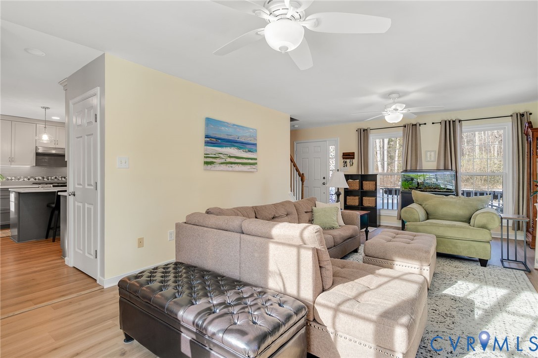 13366 Depot Road Hanover, VA 23069 - Photo 8 of 27 a living room with furniture and a wooden floor