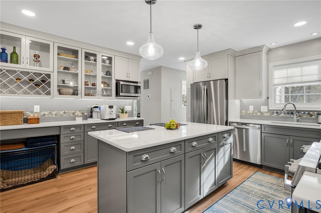 13366 Depot Road Hanover, VA 23069 - Photo 10 of 27 a kitchen with a sink stove and refrigerator