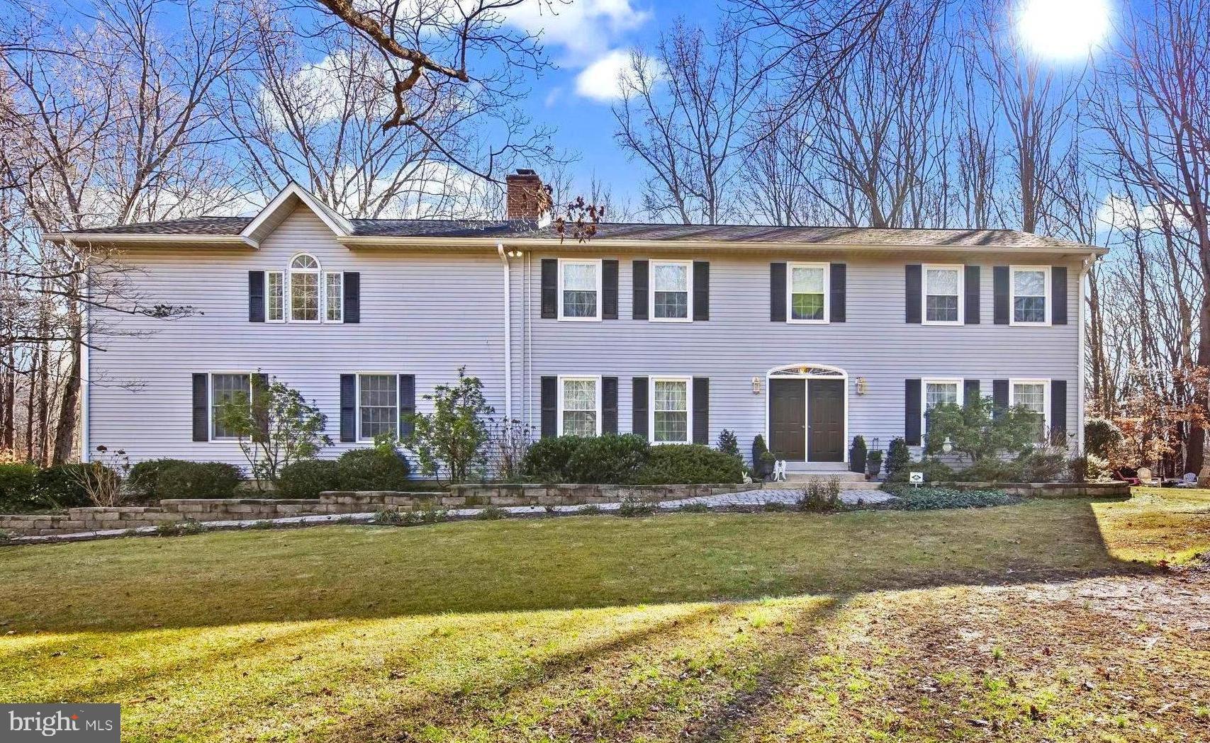213 King James Road Upper Marlboro, MD 20774 - Photo 1 of 39 a front view of residential houses with yard and swimming pool