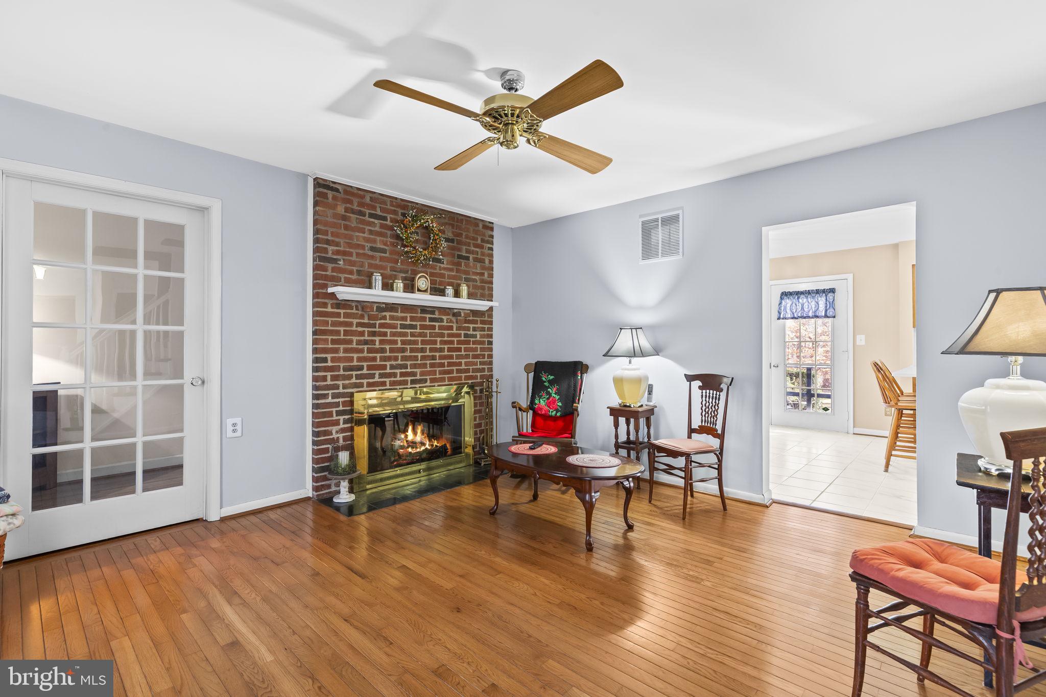 213 King James Road Upper Marlboro, MD 20774 - Photo 12 of 39 a living room with furniture and a fireplace
