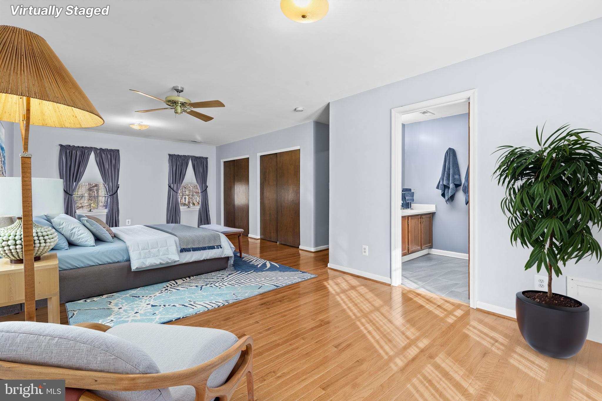 213 King James Road Upper Marlboro, MD 20774 - Photo 16 of 39 a bedroom with a bed and a potted plant