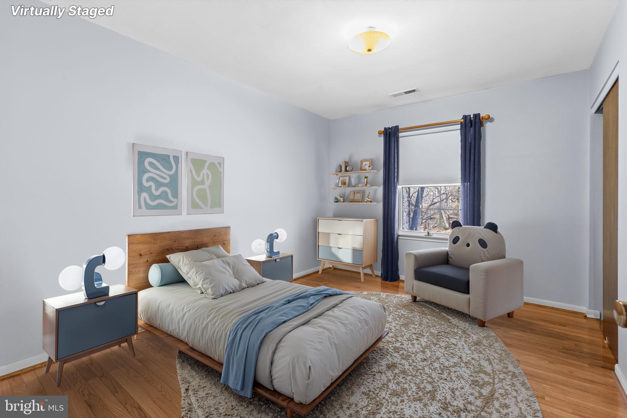 213 King James Road Upper Marlboro, MD 20774 - Photo 20 of 39 a bedroom with a bed and a couch