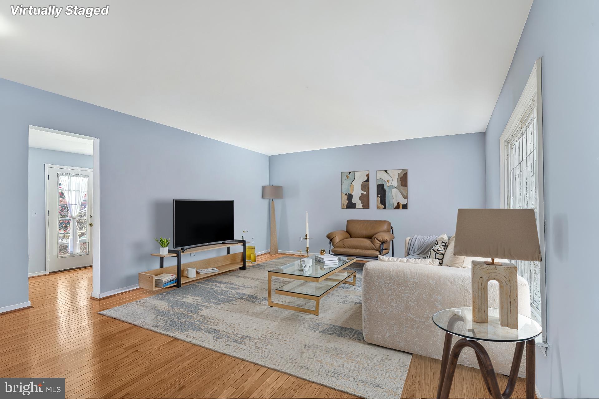 213 King James Road Upper Marlboro, MD 20774 - Photo 6 of 39 a living room with furniture and a flat screen tv