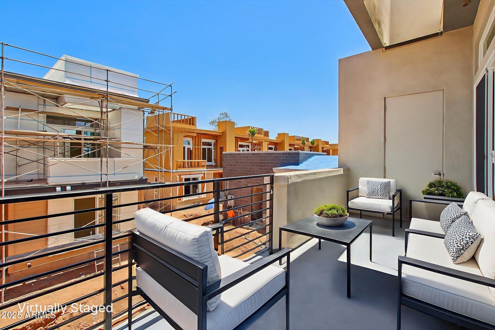 1927 South Recker Road, Unit 175 Mesa, AZ 85206 - Photo 34 of 34 a view of a balcony with outdoor seating