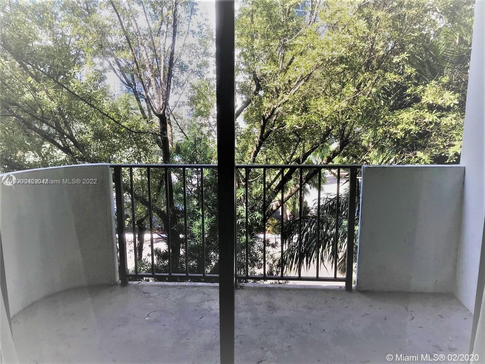1673 Bay Road, Unit 303 Miami Beach, FL 33139 - Photo 3 of 16 a view of outdoor space and garden