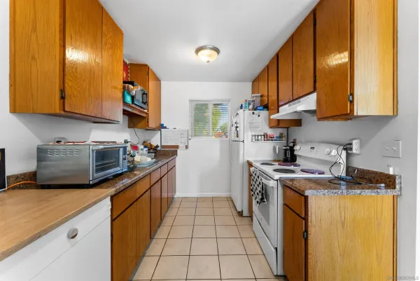a storage room with washer and dryer