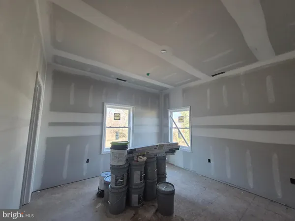 a room with furniture and window