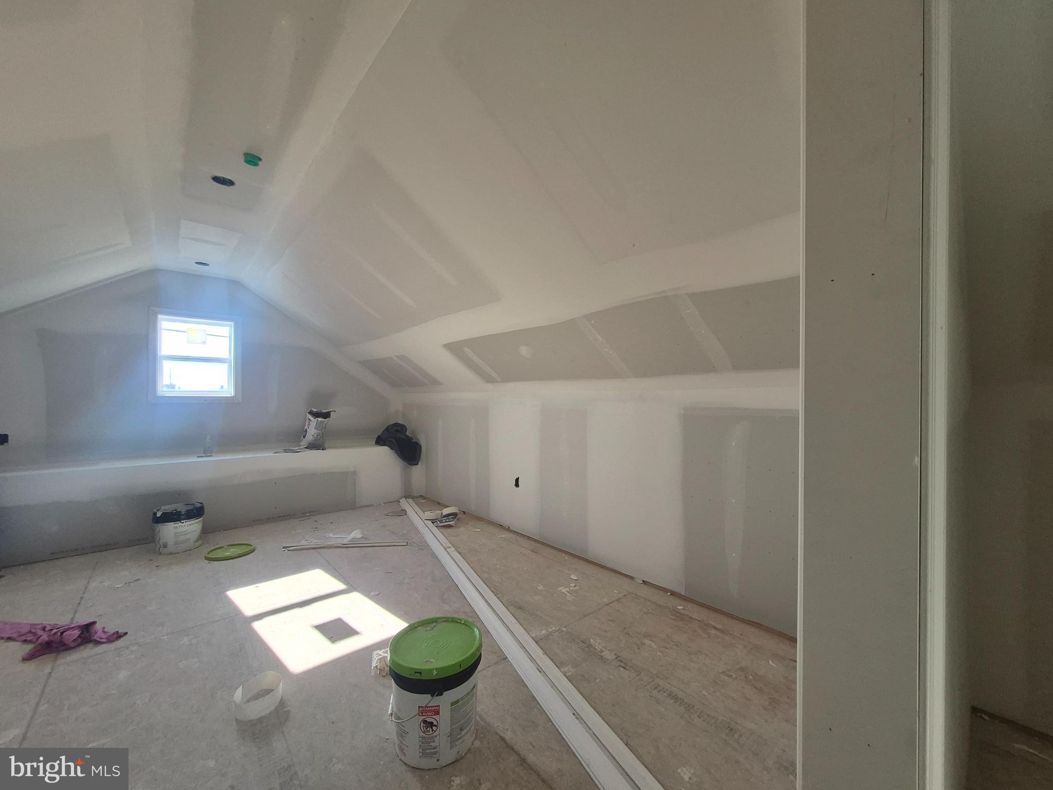 314 Locust Street Crisfield, MD 21817 - Photo 20 of 21 a living room with furniture and a window