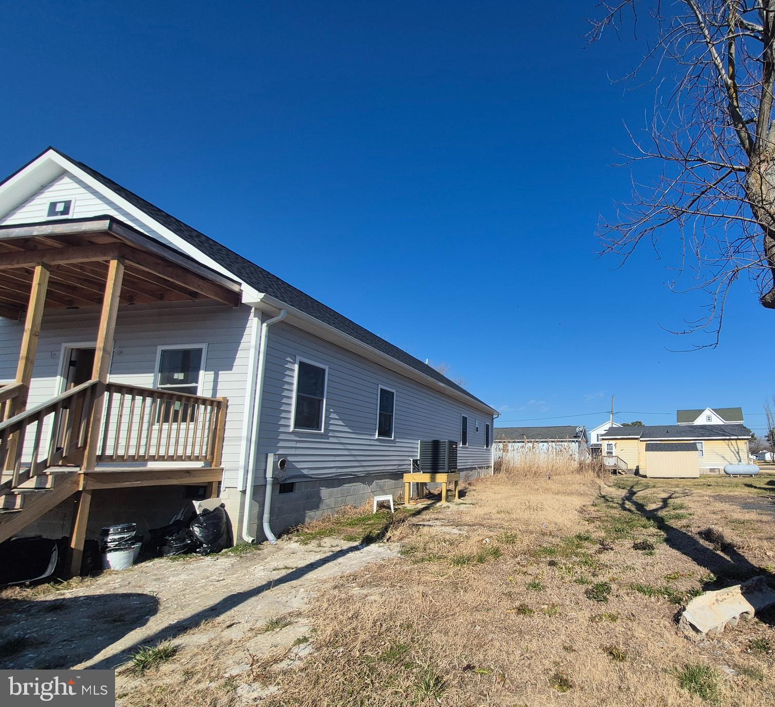 314 Locust Street Crisfield, MD 21817 - Photo 3 of 21 a front view of a house with a yard