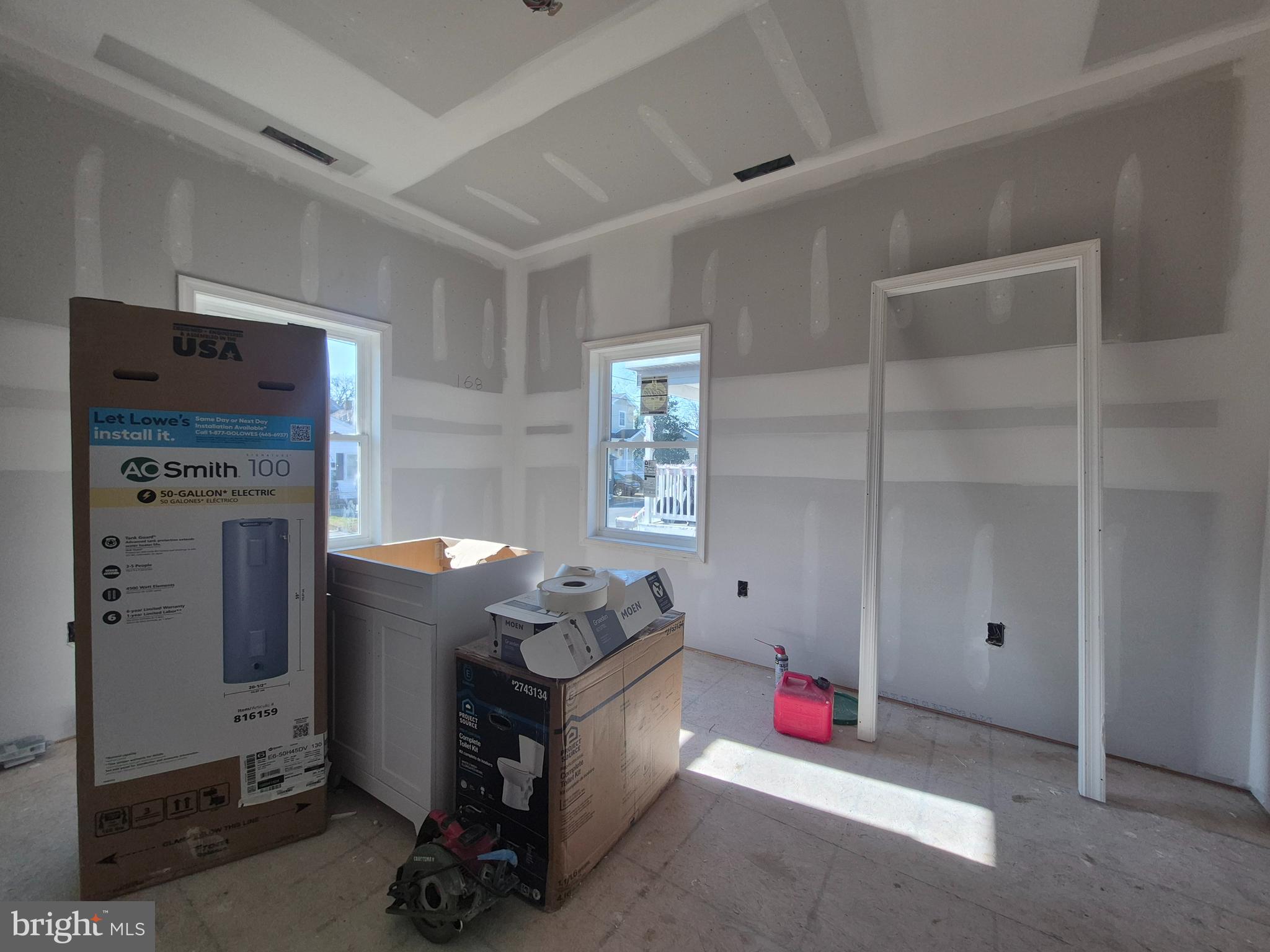 314 Locust Street Crisfield, MD 21817 - Photo 7 of 21 a living room with furniture and a fireplace