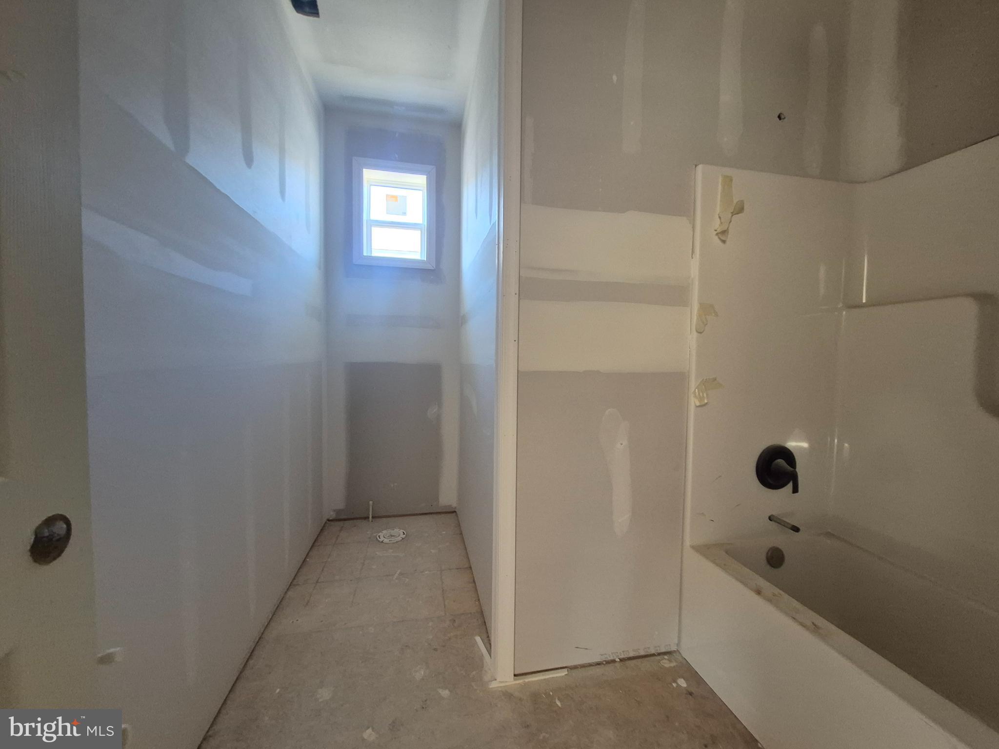 314 Locust Street Crisfield, MD 21817 - Photo 10 of 21 a bathroom with a bathtub and shower