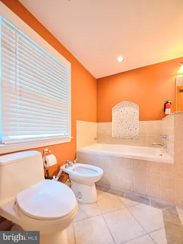 a view of a room with a bathtub