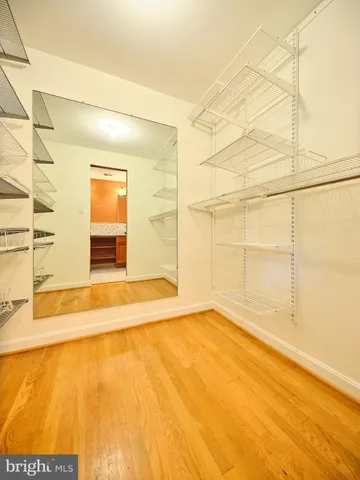 an empty room with a empty space and window