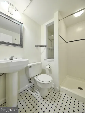 a front view of a house with a yard and porch