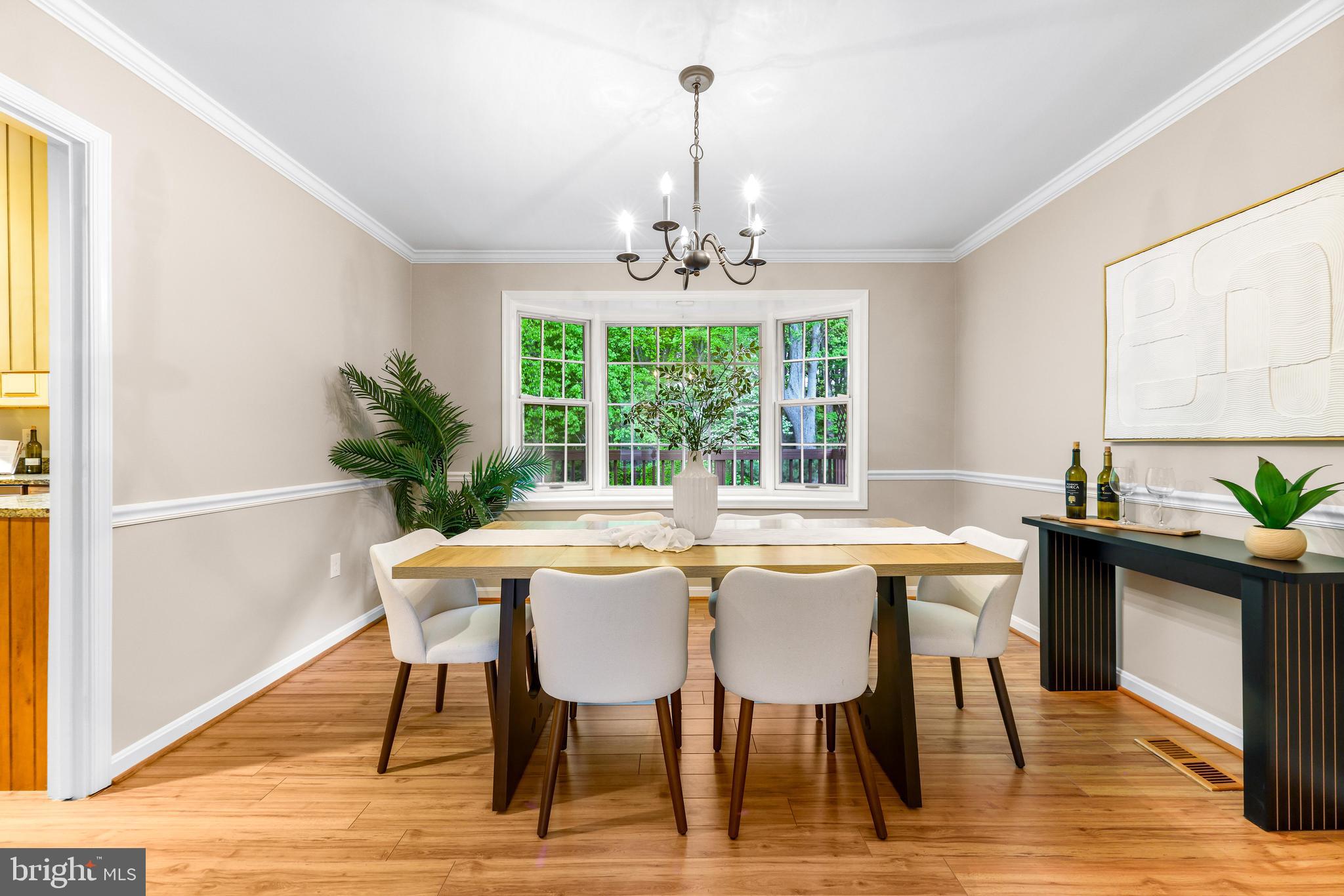 1074 Foxcroft Run Annapolis, MD 21401 - Photo 17 of 66 a view of a dining room with furniture window and wooden floor
