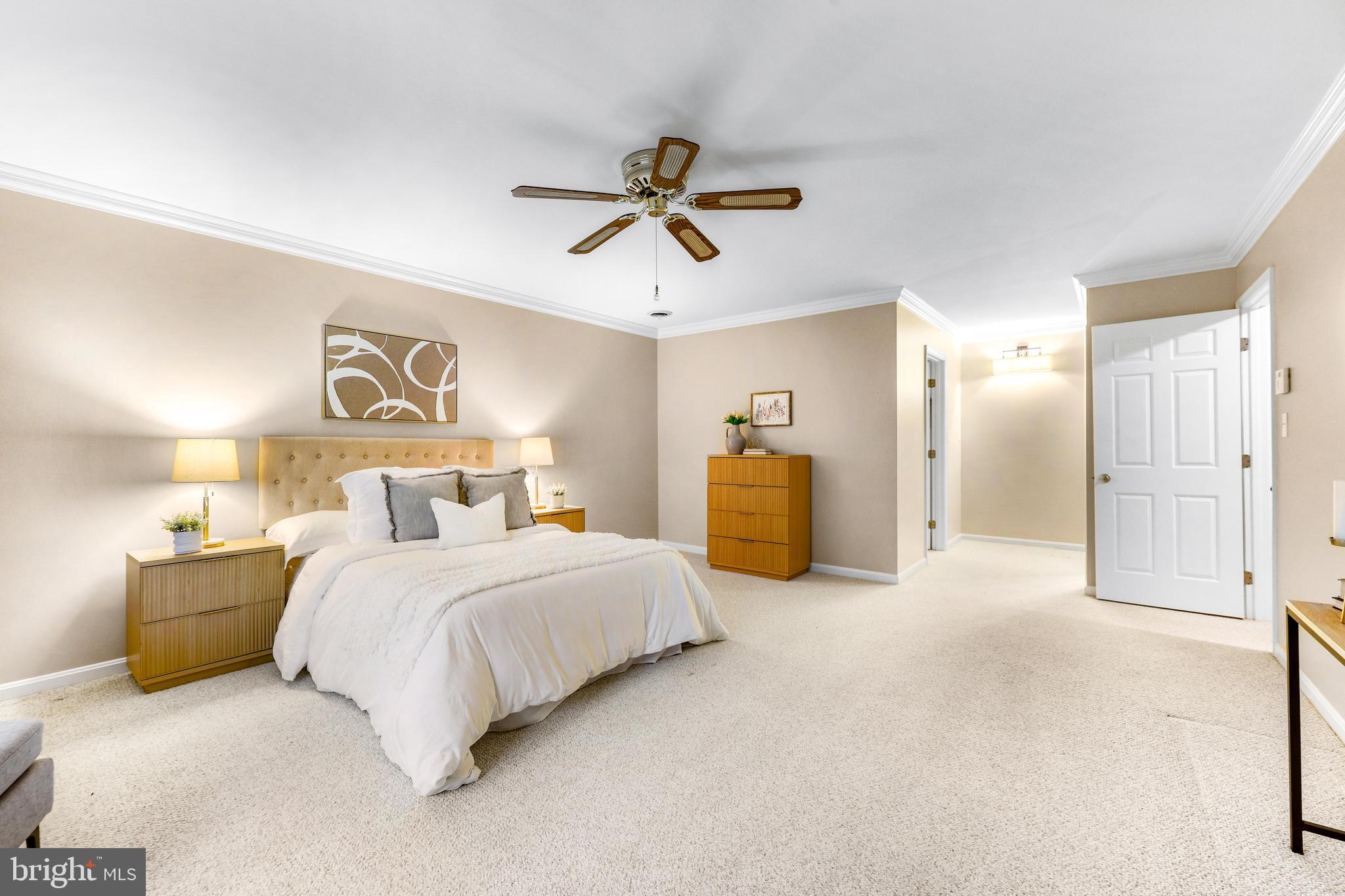 1074 Foxcroft Run Annapolis, MD 21401 - Photo 29 of 66 a spacious bedroom with a bed and ceiling fan