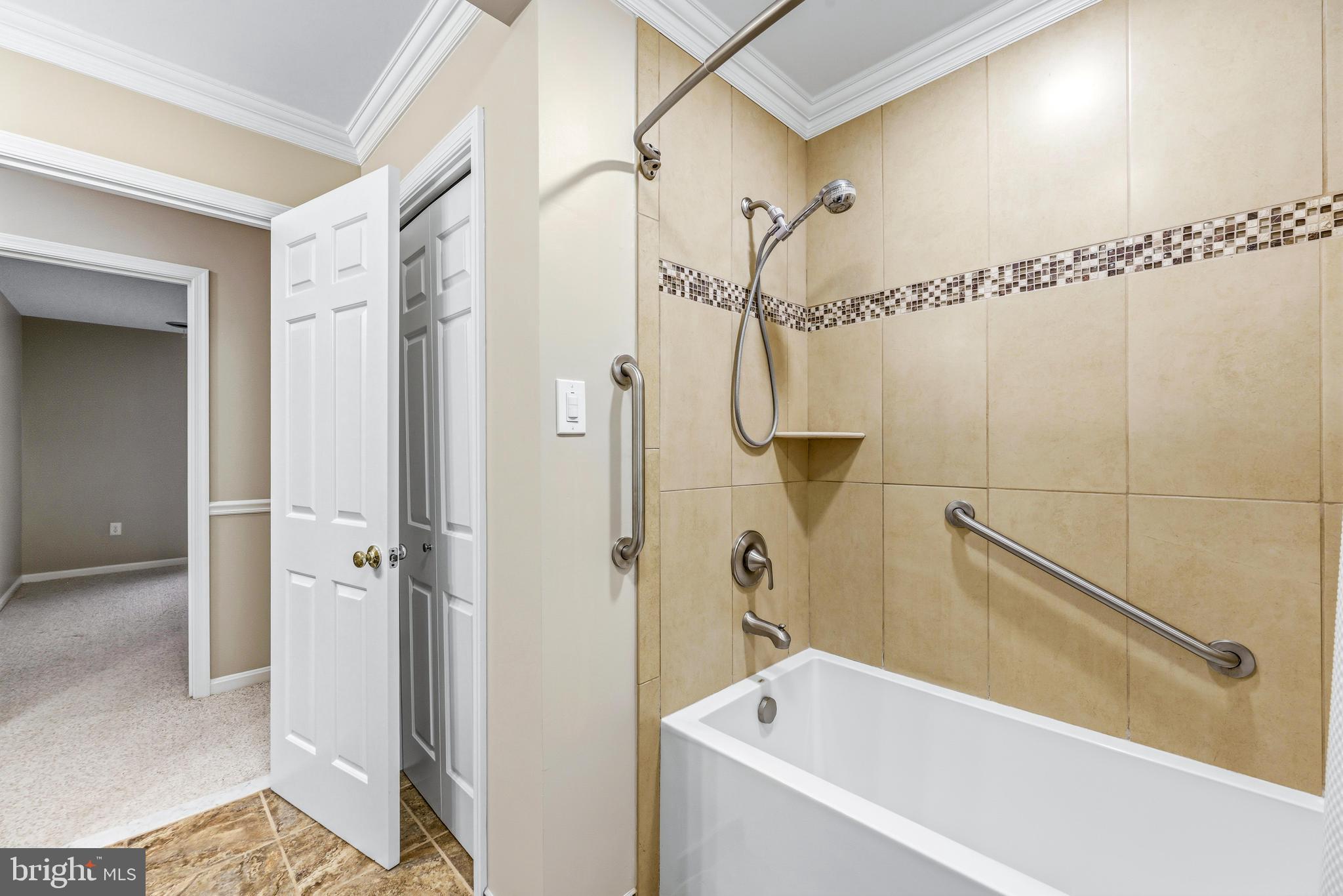 1074 Foxcroft Run Annapolis, MD 21401 - Photo 37 of 66 a bathroom with a bathtub a toilet and a shower