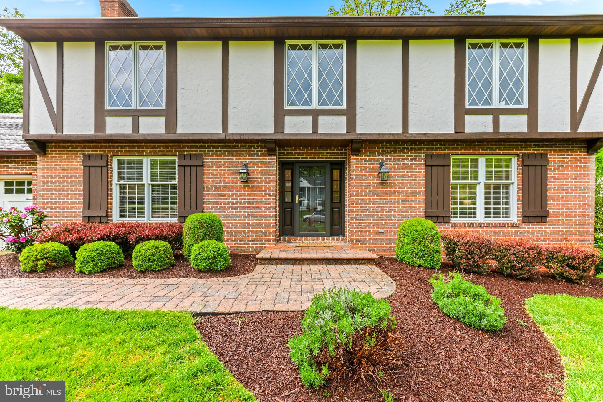 1074 Foxcroft Run Annapolis, MD 21401 - Photo 9 of 66 a front view of a house with garden