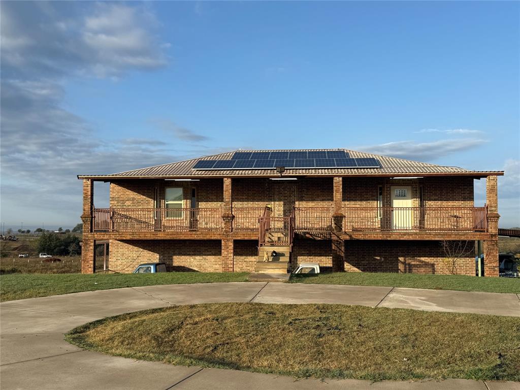 528 County Road 4227 Decatur, TX 76234 - Photo 1 of 22 a front view of a house with garden