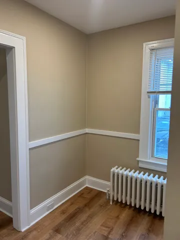 a view of small space with wooden floor