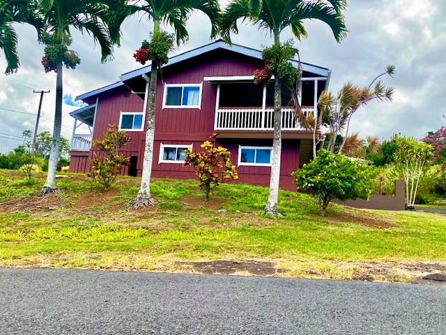 43-971 Namilimili Lane Paauilo, HI 96776 - Photo 2 of 13 a front view of house with yard swimming pool and outdoor seating