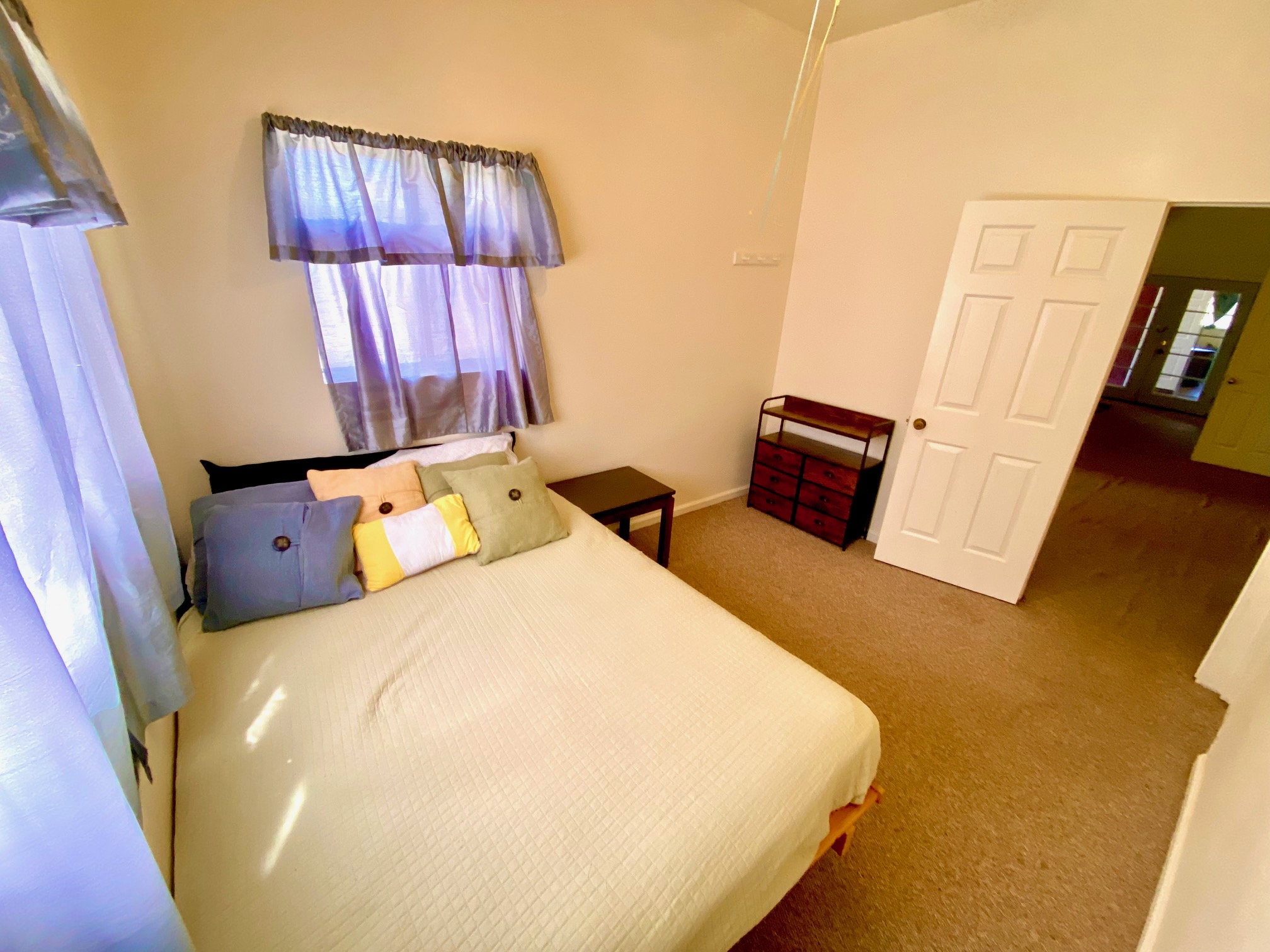 43-971 Namilimili Lane Paauilo, HI 96776 - Photo 8 of 13 a bedroom with a bed and wooden floor