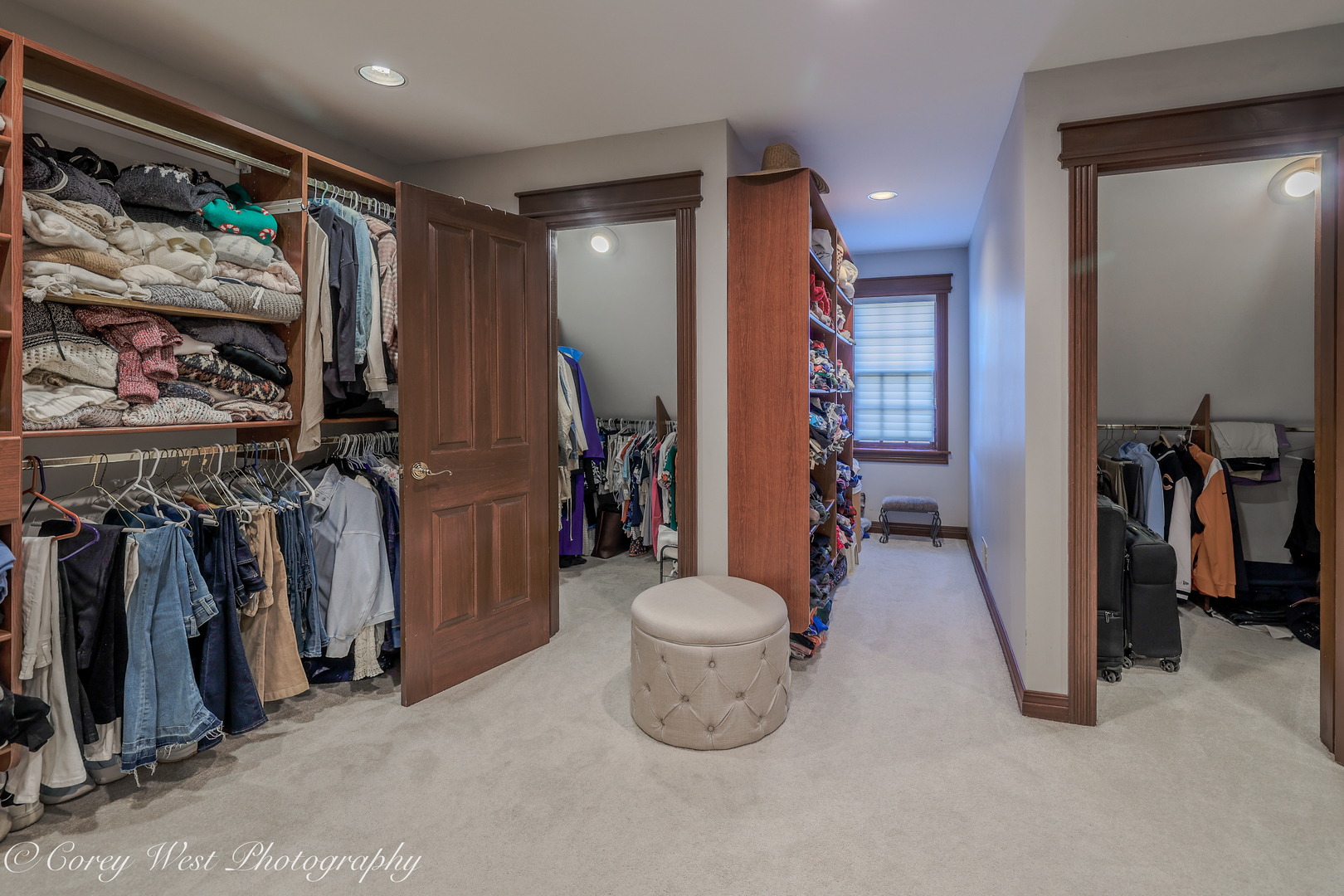 N004 Alexander Drive Geneva, IL 60134 - Photo 38 of 75 a view of walk in closet with clothes and shoes