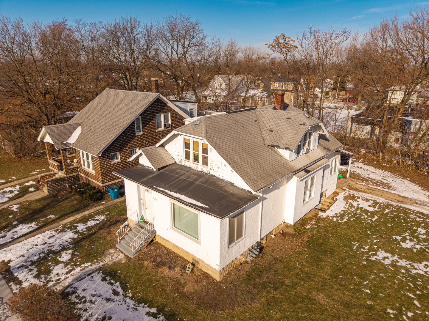 211 7th Place Chicago Heights, IL 60411 - Photo 5 of 10 a view of a house with a yard