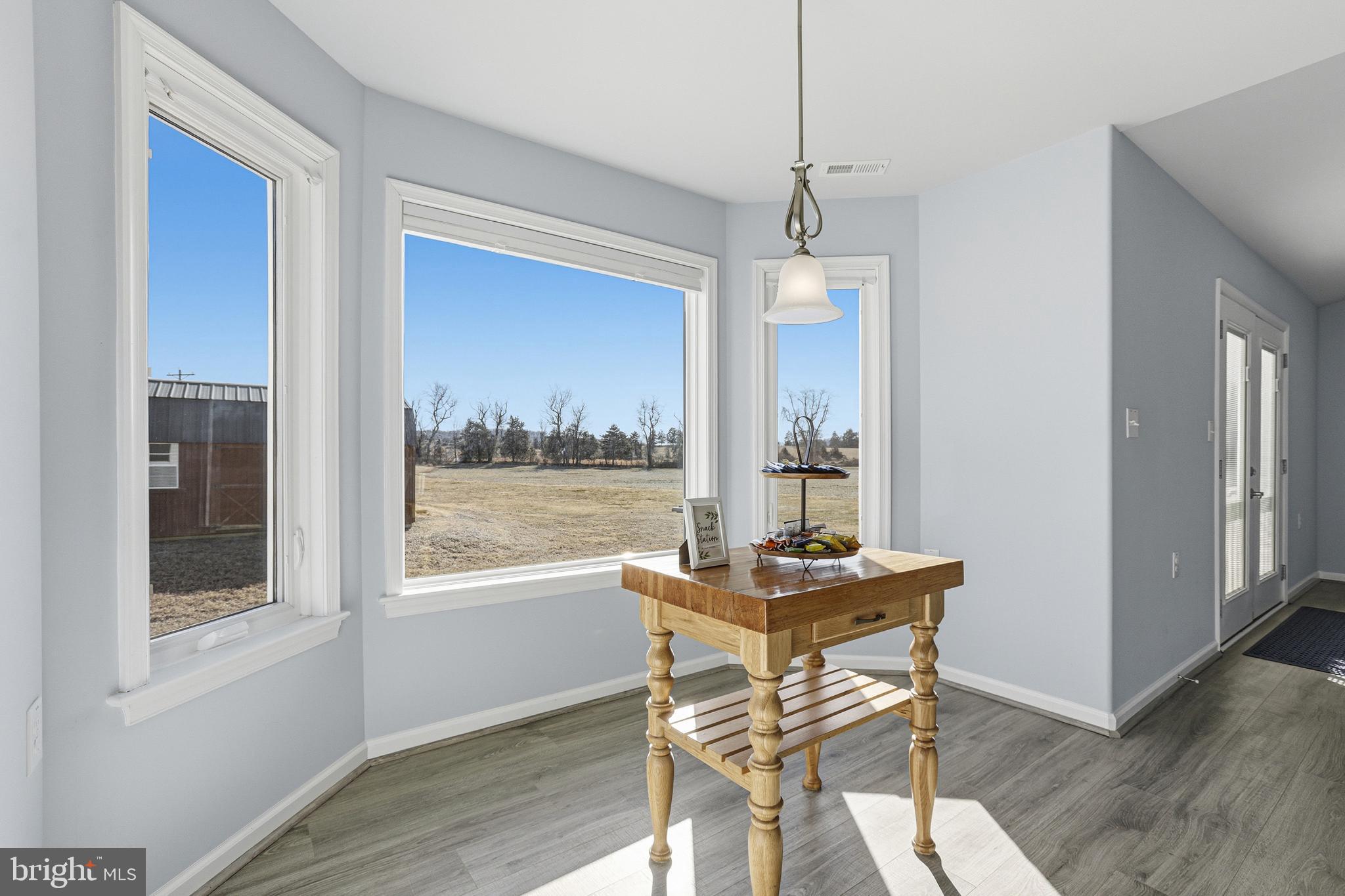 5810 West Hoover Road Reva, VA 22735 - Photo 11 of 25 a dining room with furniture and window