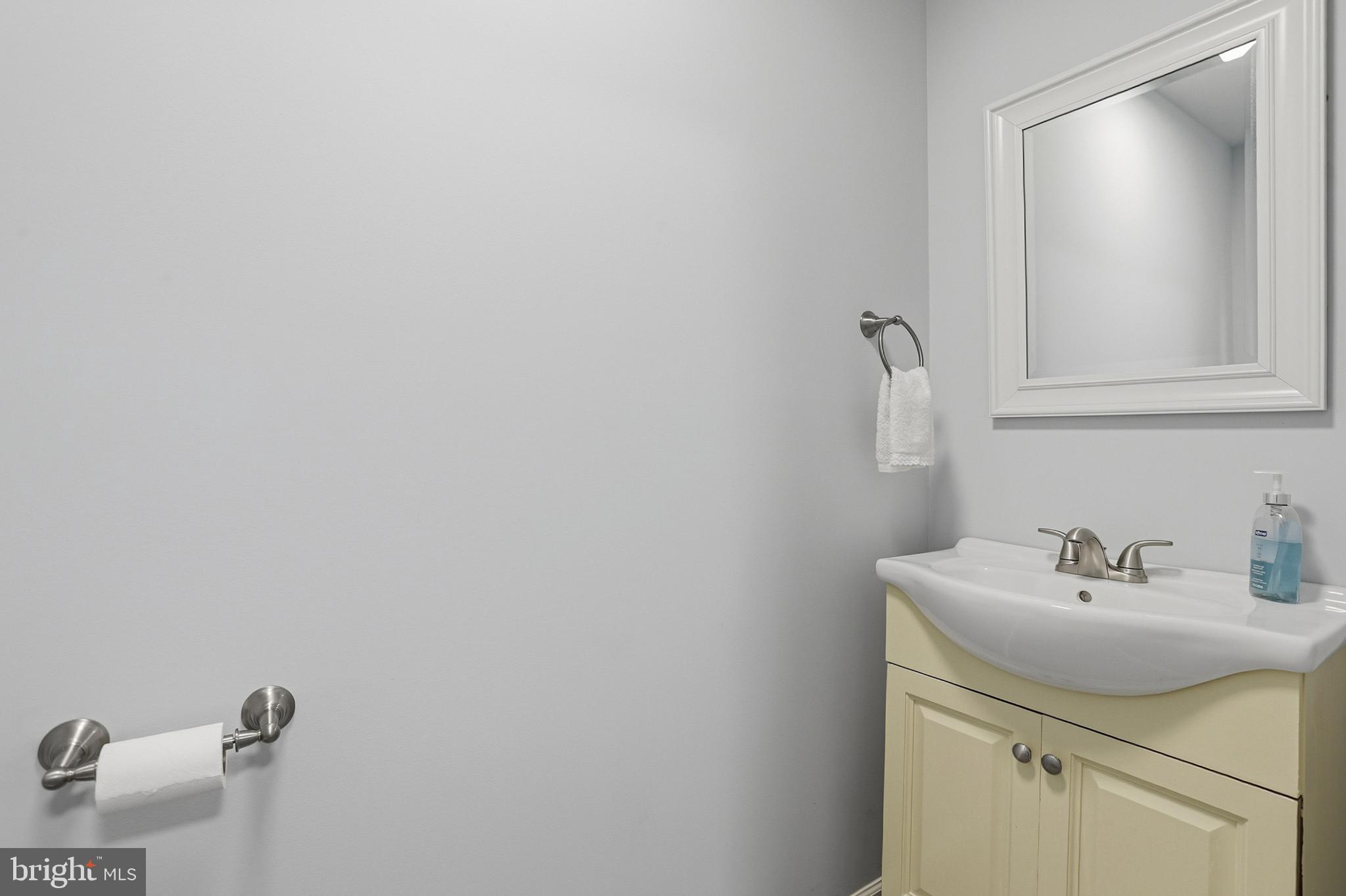 5810 West Hoover Road Reva, VA 22735 - Photo 18 of 25 a bathroom with a sink and a mirror