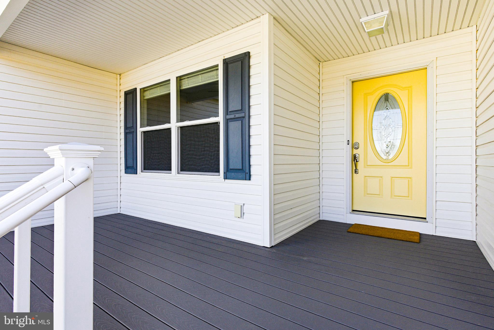 5810 West Hoover Road Reva, VA 22735 - Photo 5 of 25 a view of an entryway with wooden floor and windows