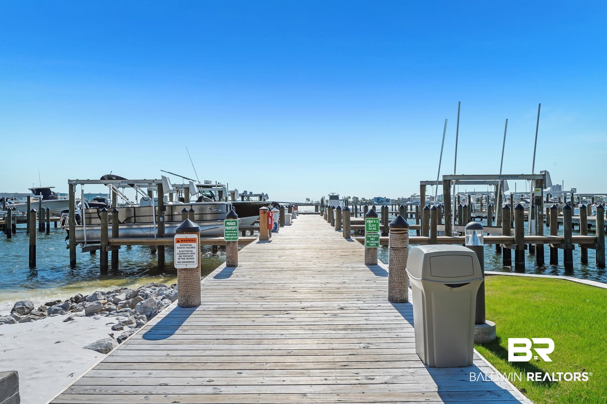 27580 Canal Road, Unit 1214 AND BOAT SLIP #62 Orange Beach, AL 36561 - Photo 62 of 67 View of dock featuring a water view and boat lift