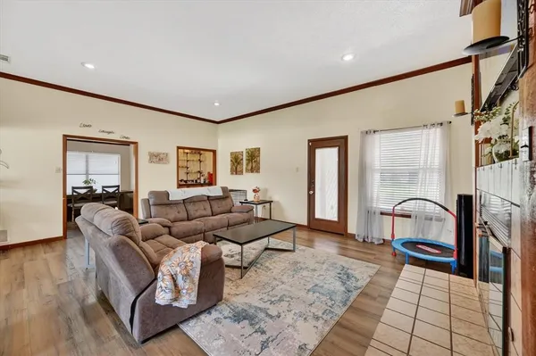 a living room with furniture and a window