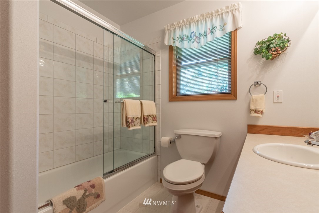 5203 53rd Street West University Place, WA 98467 - Photo 21 of 35 a bathroom with a toilet and a shower