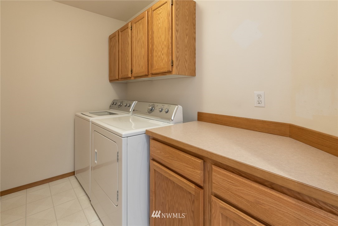 5203 53rd Street West University Place, WA 98467 - Photo 25 of 35 a utility room with dryer and washer