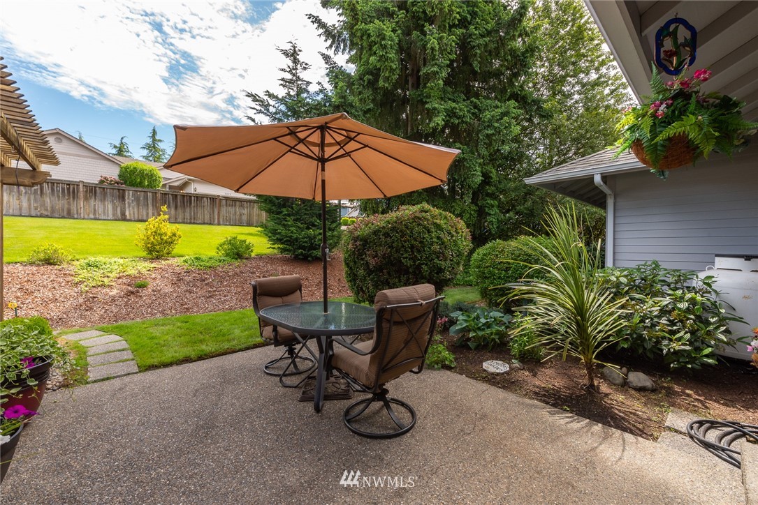 5203 53rd Street West University Place, WA 98467 - Photo 30 of 35 a view of a backyard with sitting area and furniture