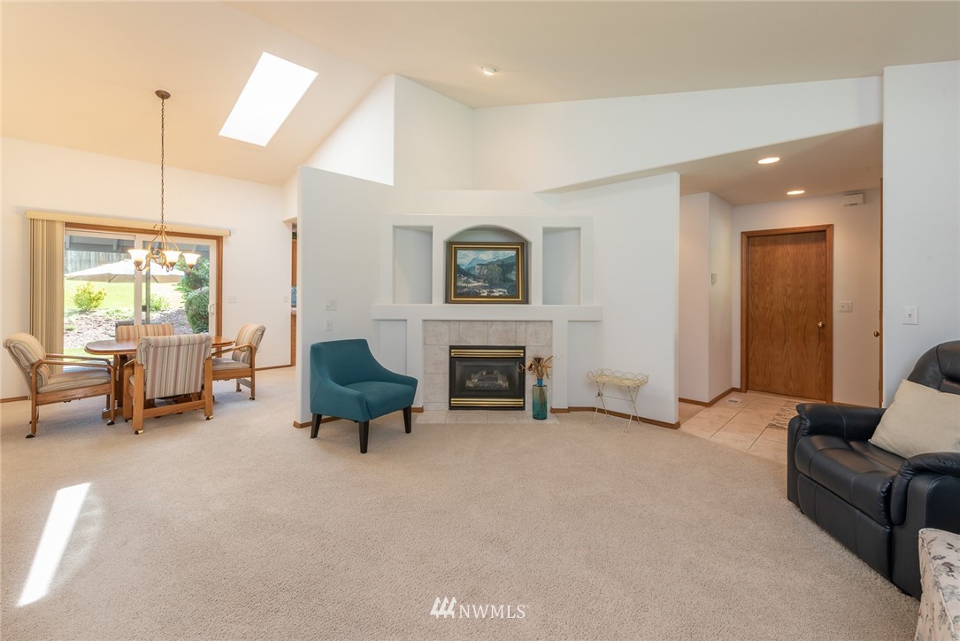 5203 53rd Street West University Place, WA 98467 - Photo 4 of 35 a living room with furniture and a fireplace
