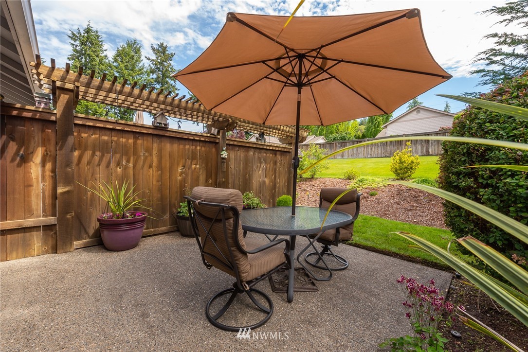 5203 53rd Street West University Place, WA 98467 - Photo 31 of 35 a view of a backyard with sitting area and furniture