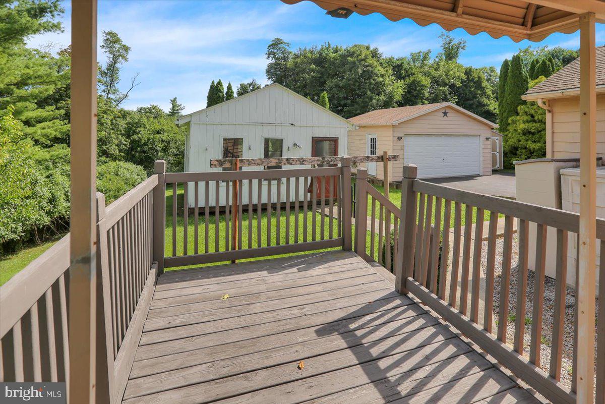 37 Harman Road Reading, PA 19606 - Photo 12 of 29 Charming deck with serene views.