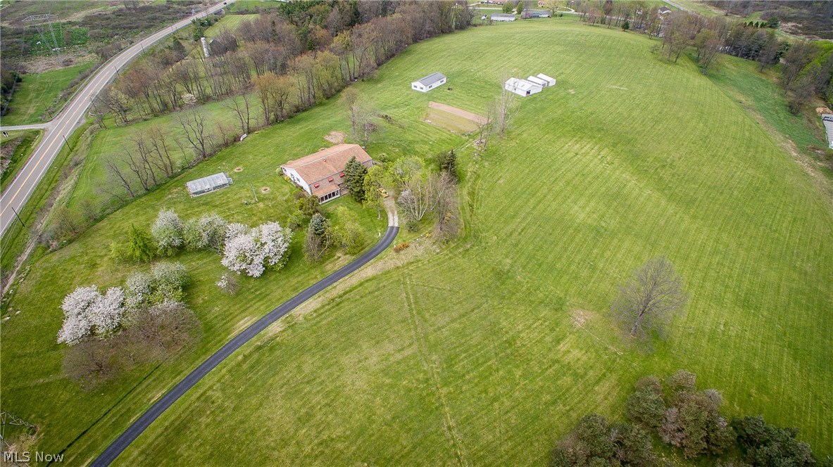 3216 Canton Road Northwest Carrollton, OH 44615 - Photo 17 of 19 FRONT AERIAL VIEW LOOKING NORTH DISPLAYS ALL BUILDINGS AND THE MAJORITY OF THE 20 ACRES! AWESOME VIEW!