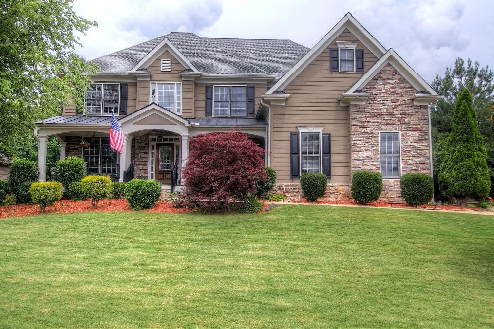 BEAUTIFUL HOME WITH LOVELY LANDSCAPING
